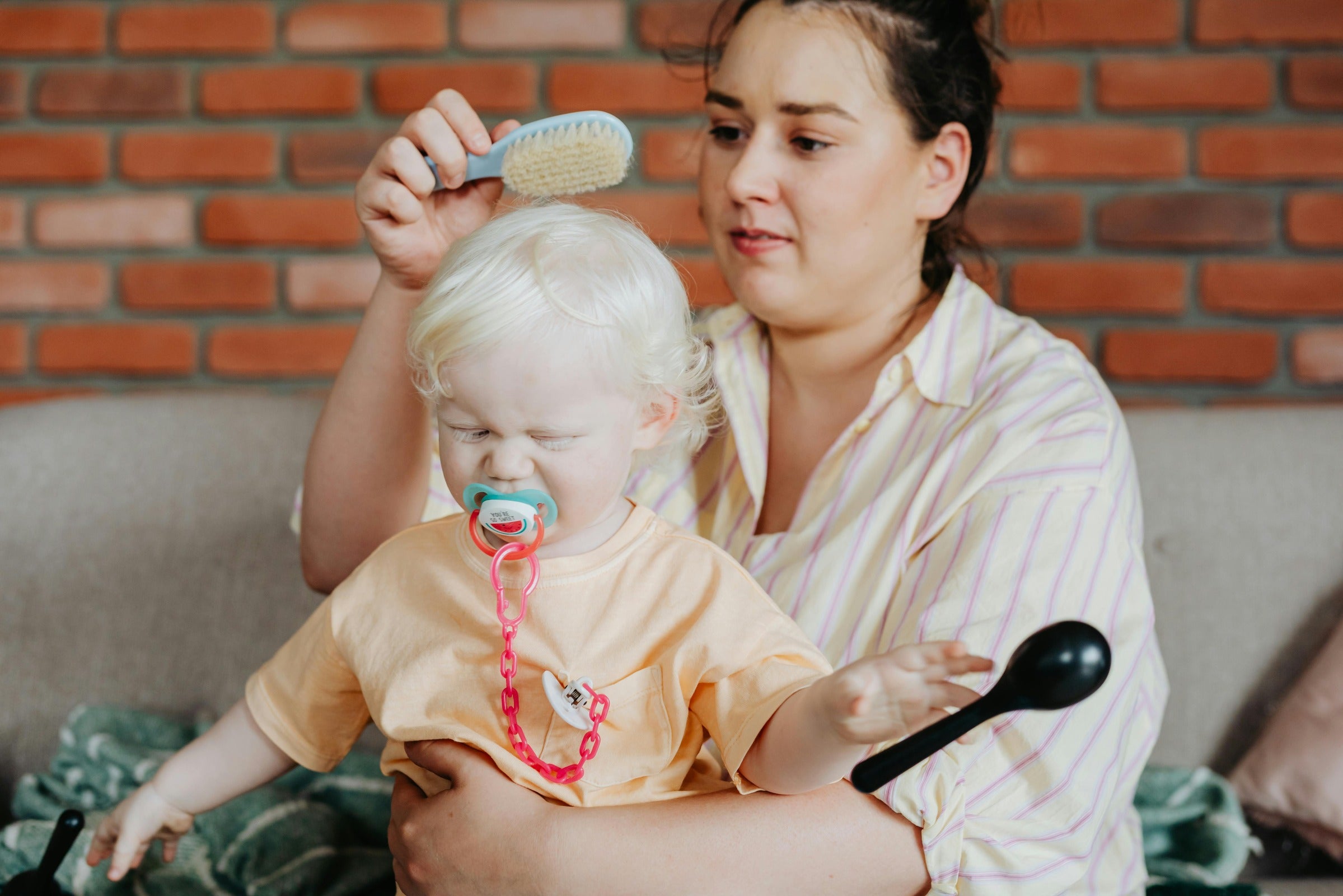 Mother doing baby care